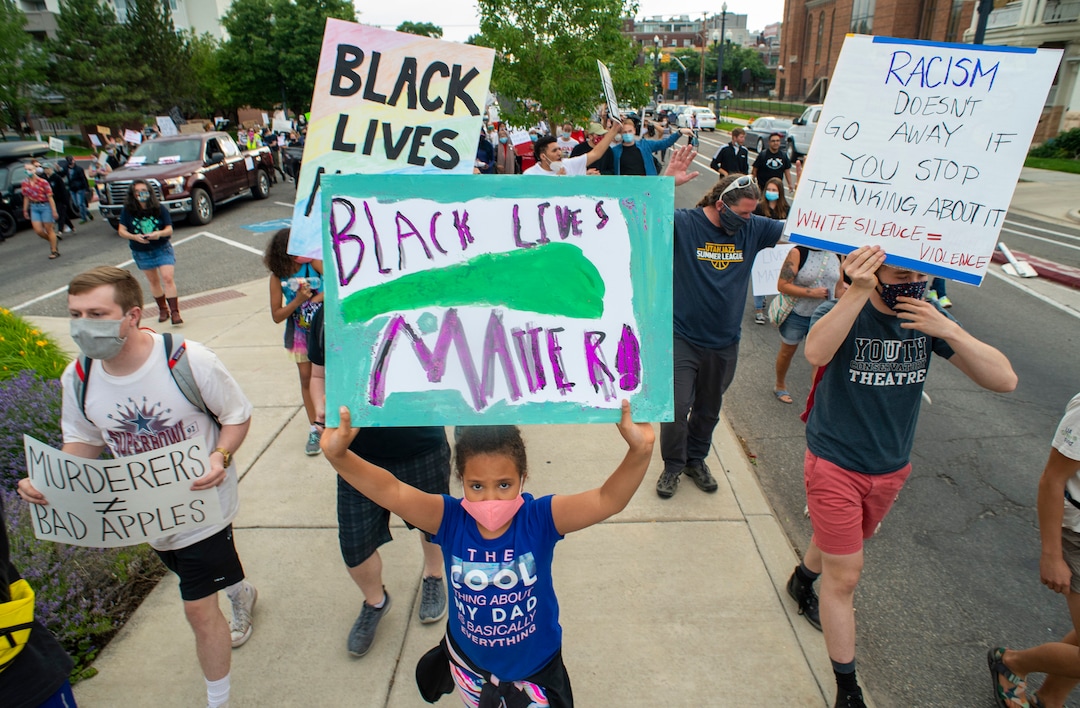 (Rick Egan  |  The Salt Lake Tribune) Demonstrators march down State Street in Salt Lake City on Saturday, June 13, 2020.
