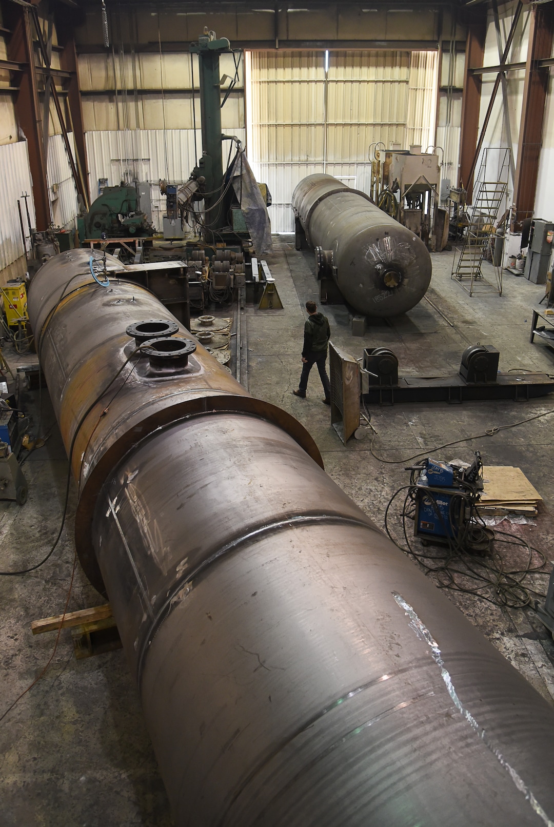 (Francisco Kjolseth  |  The Salt Lake Tribune)  Brandon Sortor, Director of Business Development of Structural Steel and Plate Fabrication in North Salt Lake, overlooks a large air tank that will be used to power a ride at a Six Flags amusement park in Chicago. Recent metal tariffs have proven challenging for the company due to material availability forcing the company to pay a premium. 