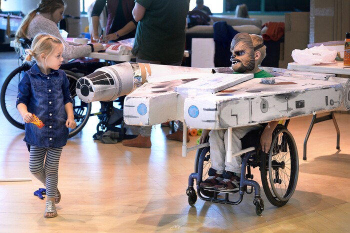 (Scott Sommerdorf | The Salt Lake Tribune)
Nine year old Davey Killpack tries out his wheelchair with the "Millennium Falcon" addition as Shriners Hospitals for Children volunteers transform the wheelchairs of 20 patients for Halloween, Wednesday, October 18, 2017.