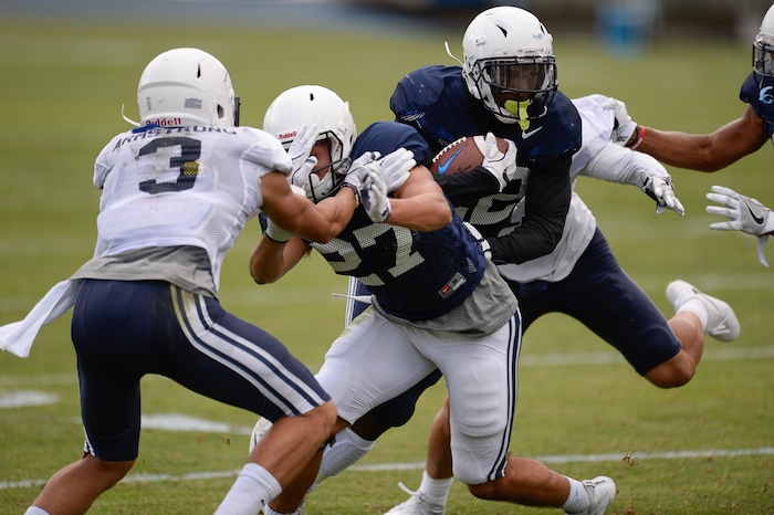 (Francisco Kjolseth  |  The Salt Lake Tribune)  Squally Canada maneuvers for an opening as BYU holds a scrimmage at LaVell Edwards Stadium in Provo on Thursday, Aug. 10, 2017.