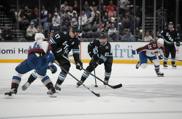 (Bethany Baker | The Salt Lake Tribune) Utah Hockey Club left wing Matias Maccelli (63) skates to the goal to eventually score with Utah Hockey Club left wing Lawson Crouse (67) as Colorado Avalanche defenseman Calvin de Haan (44) defends during the game between the Utah Hockey Club and the Colorado Avalanche at the Delta Center in Salt Lake City on Thursday, Oct. 24, 2024.