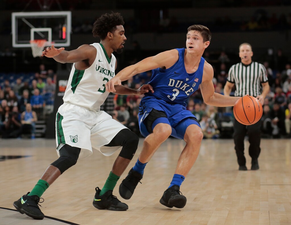 Portland State's Deonte North (3) guards Duke's Grayson Allen (3) during an NCAA basketball game during the Phil Knight Invitation tournament in Portland, Ore., Thursday, Nov. 23, 2017. (AP Photo/Timothy J. Gonzalez)