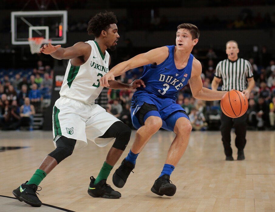 Portland State's Deonte North (3) guards Duke's Grayson Allen (3) during an NCAA basketball game during the Phil Knight Invitation tournament in Portland, Ore., Thursday, Nov. 23, 2017. (AP Photo/Timothy J. Gonzalez)