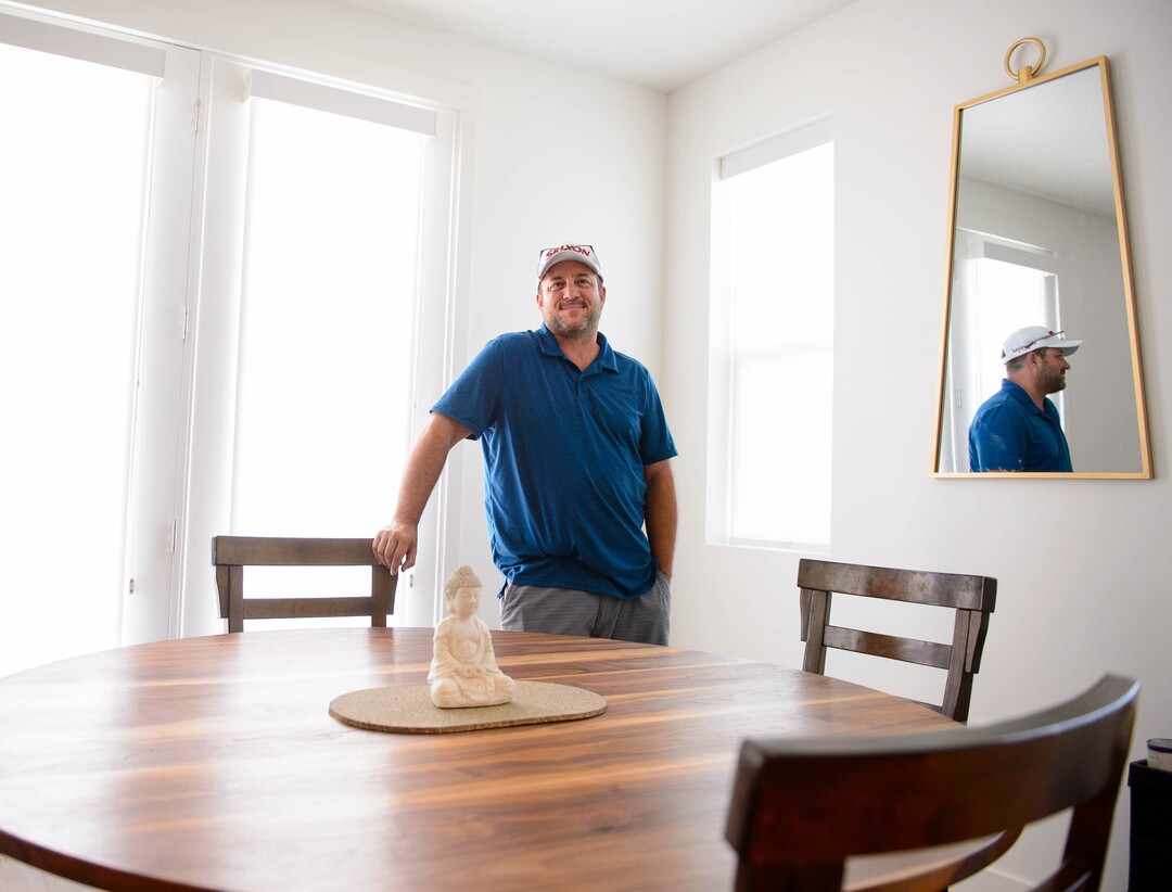 (Trent Nelson | The Salt Lake Tribune) Al Walter in his new energy-efficient home in the Granite Legacy community in South Salt Lake on Tuesday, July 16, 2019. Garbett Homes is behind the project.