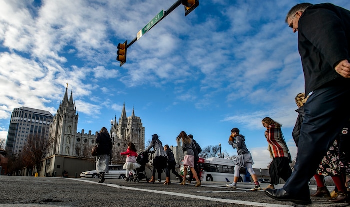 (Steve Griffin  |  The Salt Lake Tribune) Mourners cross North temple after paying their last respects to LDS Church President Thomas S. Monson during a public viewing at the Conference Center in Salt Lake City Thursday January 11, 2018.