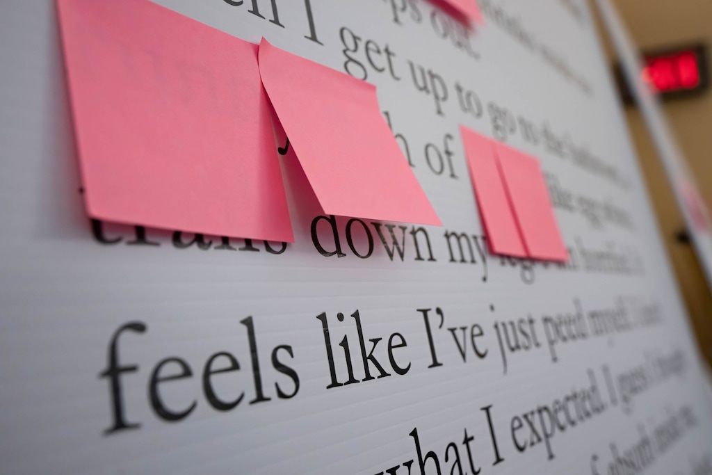 (Francisco Kjolseth  | The Salt Lake Tribune) An excerpt from the book “What Girls Are Made Of” by Elana K. Arnold is censored with sticky notes during a news conference at the Utah Capitol to discuss the removal of 13 books statewide from public schools on Thursday Aug. 29, 2024.