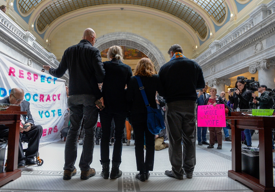 Leah Hogsten  |  The Salt Lake Tribune  Faith leaders r-l Rev. Curtis Price with The First Baptist Church of Salt Lake City, Rev. Monica Dobbins with the First Unitarian Church of Salt Lake City, Zen Buddhist Anna Zumwalt and Pastor David Nichols with Mt. Tabor Lutheran Church demonstrate in opposition to SB96 outside the Utah House chambers, Feb. 8, 2019. 
