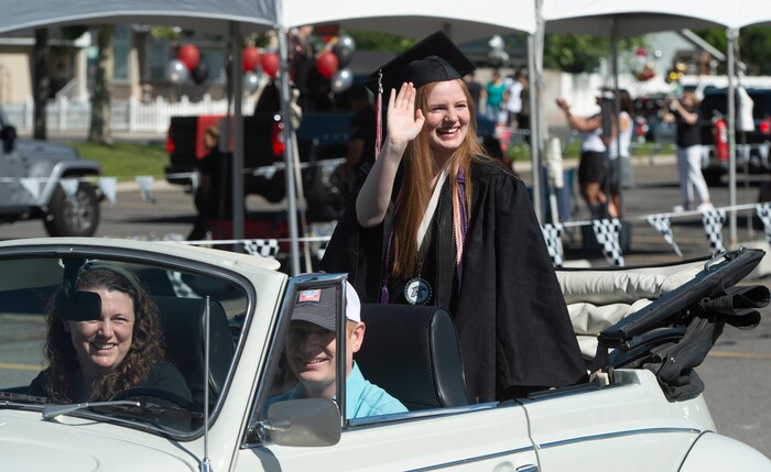 (Rick Egan  |  The Salt Lake Tribune)     Katie Brennan joins the other Alta High seniors in the parade of 2020 graduates in a “drive through” graduation ceremony at Alta High, Thursday, May 28, 2020.
