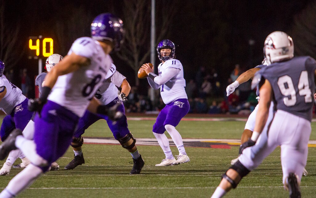 (Jordan Allred | The Spectrum & Daily News) Weber State quarterback Stefan Cantwell (11) drops back to pass during Saturday's FCS playoff game against Southern Utah, December 2, 2017, in Cedar City, Utah. Weber State defeated Southern Utah 30-13.