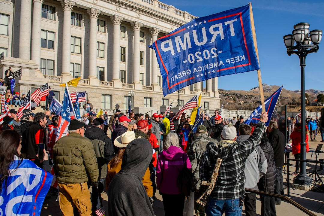 (Trent Nelson  |  The Salt Lake Tribune) A group of Trump supporters listens to speeches at the State Capitol in Salt Lake City on Wednesday, Jan. 6, 2021.