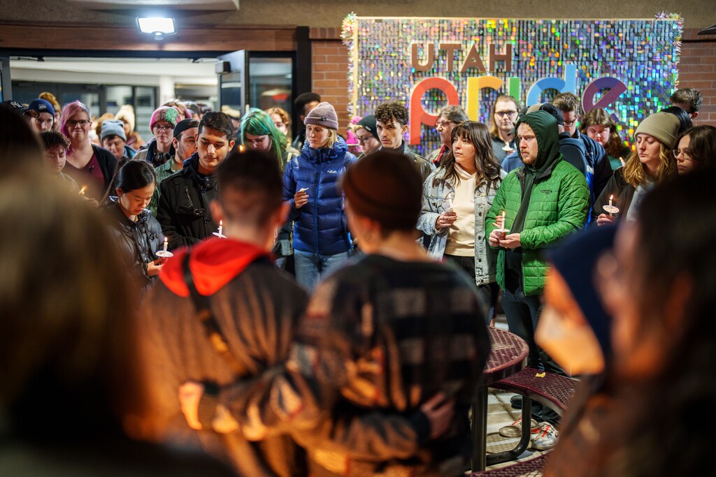 (Trent Nelson  |  The Salt Lake Tribune) People gather at the Utah Pride Center in Salt Lake City on Nov. 21, 2022, for a candlelight vigil for the victims of a shooting in Colorado Springs.