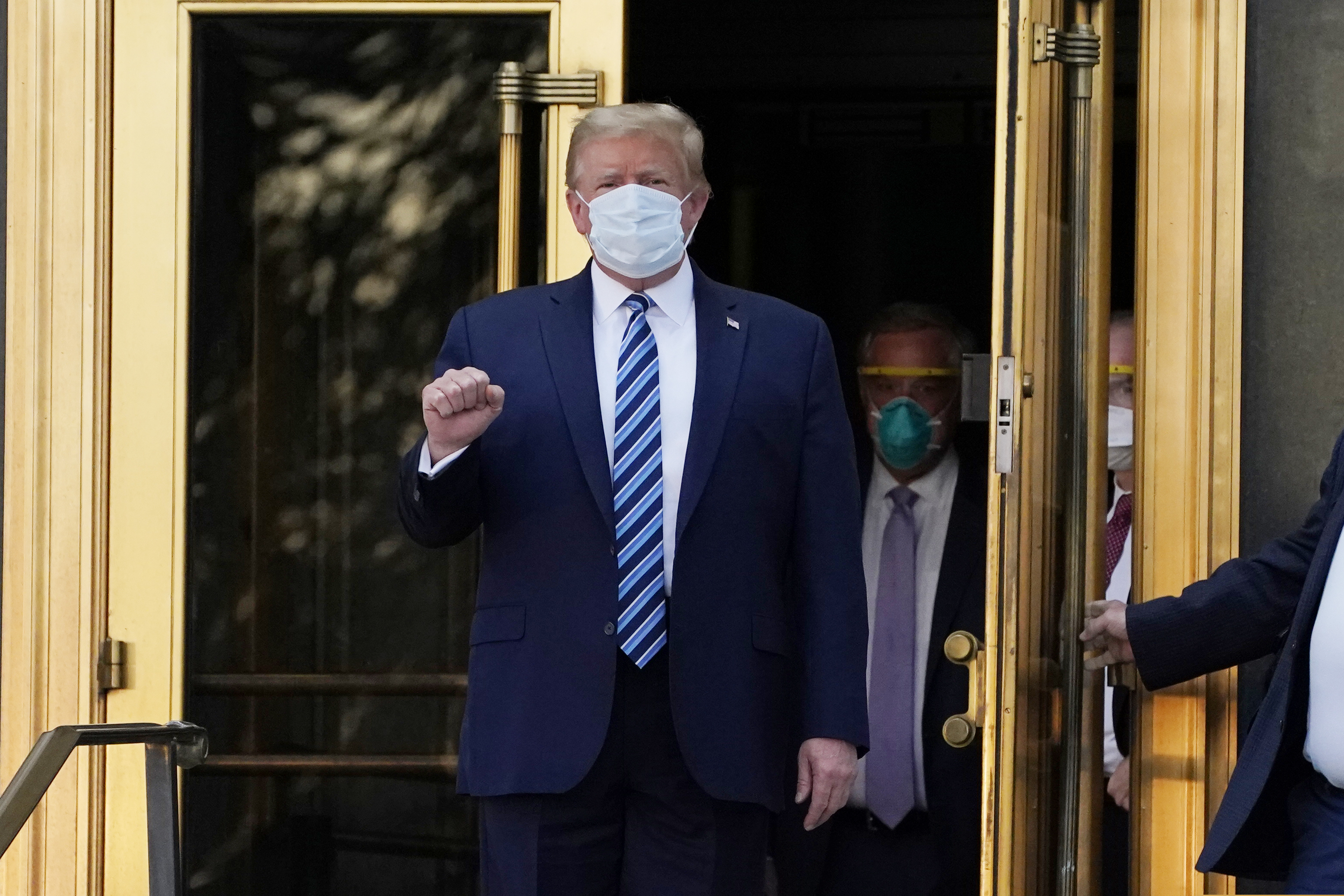 (Evan Vucci | AP file photo)  President Donald Trump walks out of Walter Reed National Military Medical Center to return to the White House after receiving treatments for COVID-19, Monday, Oct. 5, 2020, in Bethesda, Md.