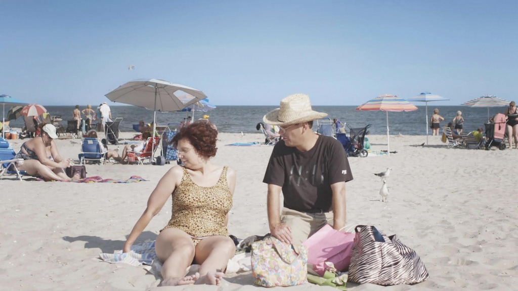 (Courtesy The Orchard) Dina Buno (left) and Scott Levin, an engaged couple who are both on the autism spectrum, enjoy a day at the beach, in a scene from the documentary "Dina."