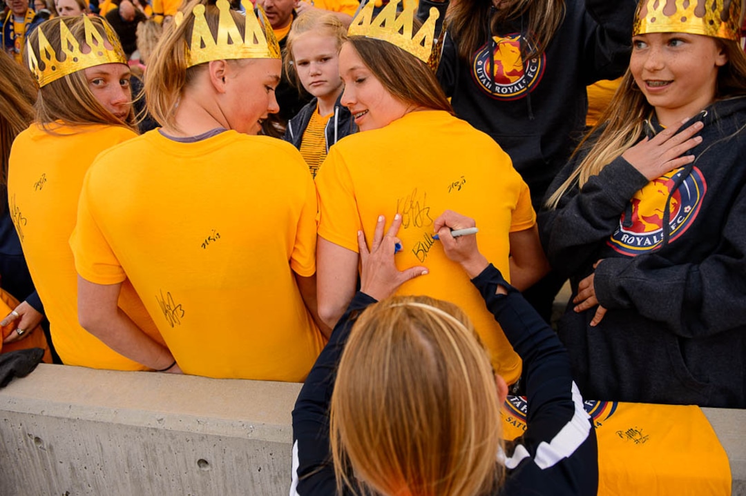 (Trent Nelson | The Salt Lake Tribune)  Utah Royals FC hosts the Chicago Red Stars, at Rio Tinto Stadium in Sandy, Saturday April 14, 2018. Utah Royals FC forward Brittany Ratcliffe (25) autographs t-shirts.