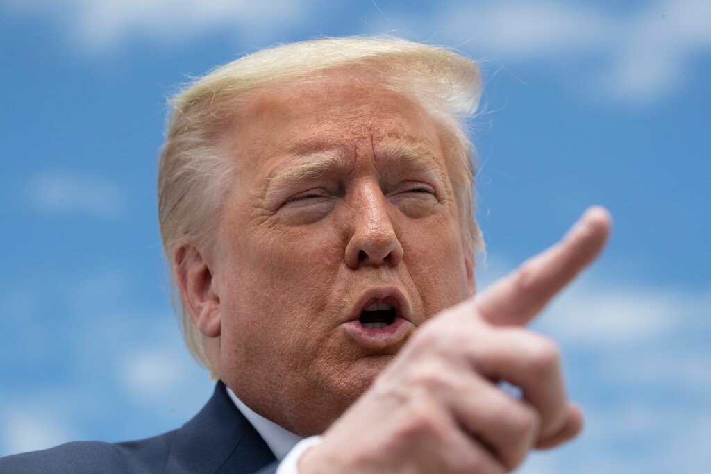 (Alex Brandon | AP file photo)  President Donald Trump speaks with reporters before boarding Air Force One as he departs Saturday, May 30, 2020, at Andrews Air Force Base, Md.