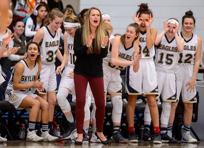 (Trent Nelson | The Salt Lake Tribune)  Skyline players celebrate a score as Skyline faces Springville in the 5A High School Girls' Basketball Tournament at SLCC in Taylorsville, Wednesday Feb. 21, 2018.