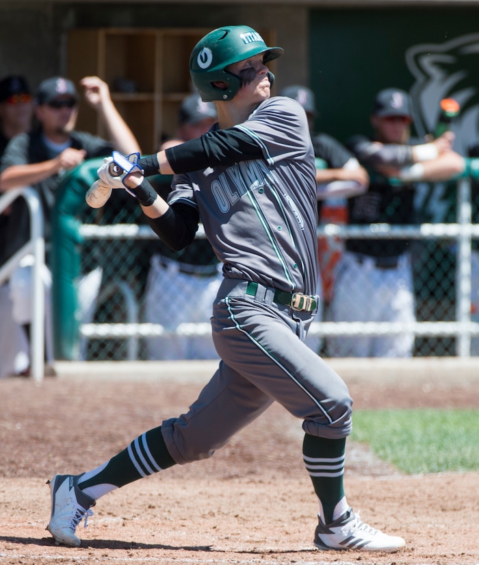 (Rick Egan  |  The Salt Lake Tribune)   Hayden Curtis hits a double for Olympus, in the 5A state baseball championship game between Olympus and Jordan, at UVU in Orem, Friday, May 25, 2018.