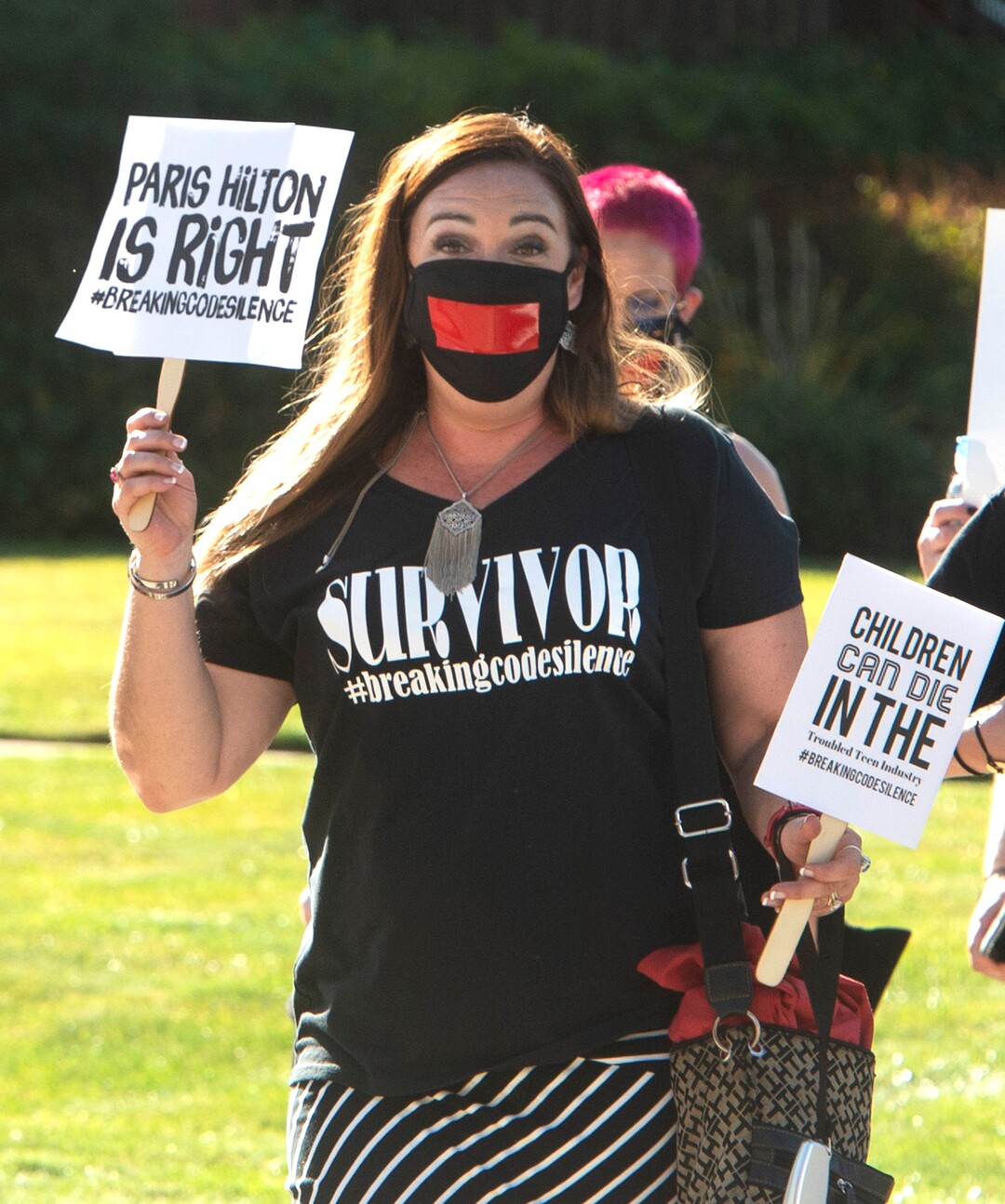 (Rick Egan  |  The Salt Lake Tribune)    Alexis Frevzza fro Austin Tx, joins a march to the Provo Canyon School, during a rally calling for the closure of Provo Canyon School, a residential treatment center in Utah she attended when she was a teen, on Friday, Oct. 9, 2020.