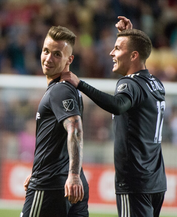 (Rick Egan  |  The Salt Lake Tribune)     Real Salt Lake forward Brooks Lennon (12) celebrates the goal by Real Salt Lake midfielder Albert Rusnak (11) late in the game, in MLS soccer action, between Real Salt Lake and Colorado Rapids,  at Rio Tinto Stadium, Saturday, April 21, 2018.


