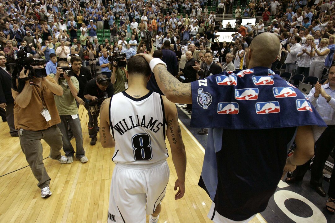 (Trent Nelson  |  Tribune file photo) Utah's Carlos Boozer, right, and Deron Williams walk off the court after the L.A. Lakers eliminated the Jazz from the Western Conference playoffs on May 16, 2008.