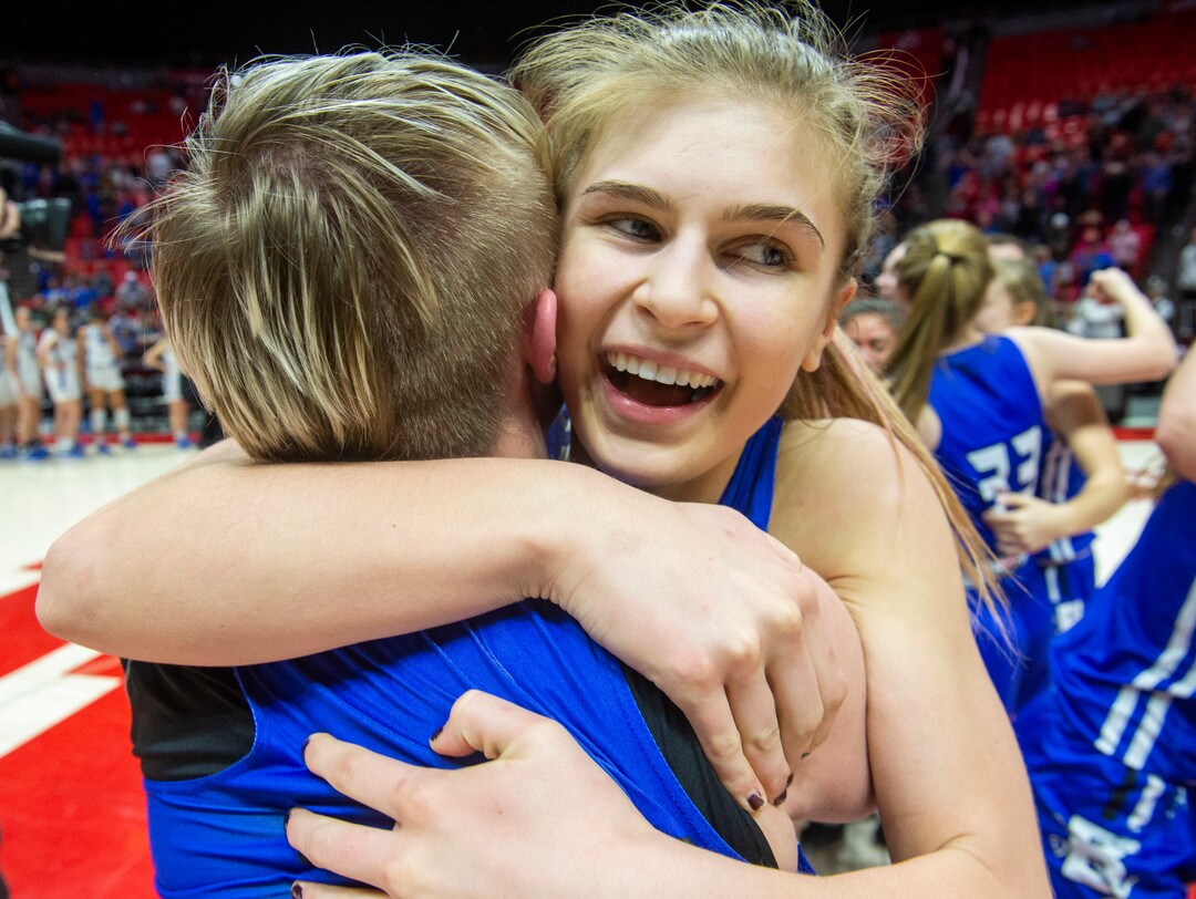 (Rick Egan  |  The Salt Lake Tribune)   Bingham Miners Sierra Lichtie (20) hugs Madison Jones  (22) as the Bingham Miners celebrate their 59-51 win over the Fremont Silverwolves, in the 6A championship game, at the Jon M. Huntsman Center, Saturday Feb. 29, 2020