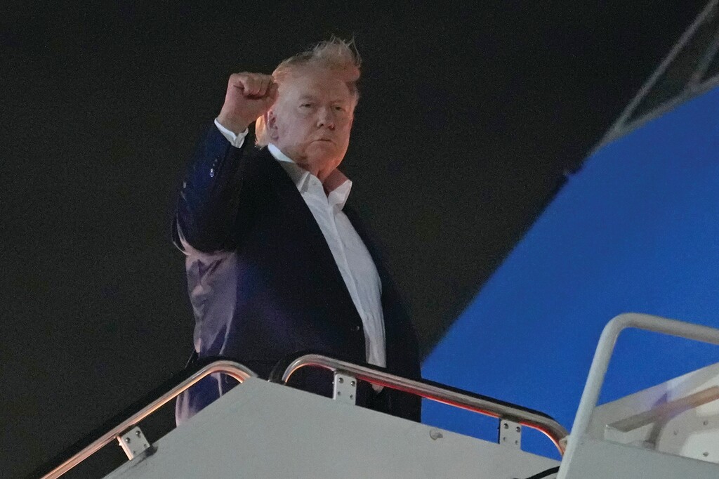 President Donald Trump gestures as he boards Air Force One, Monday, June 15, 2026, at Joint Base Andrews, Md. (AP Photo/Julia Demaree Nikhinson)