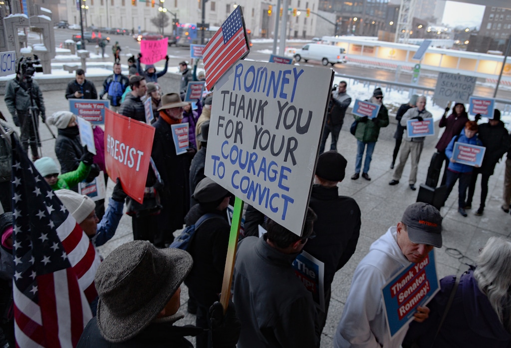(Francisco Kjolseth | Tribune file photo) People gather in support of Sen. Mitt Romney, R-Utah, at the Wallace F. Bennett Federal Building in Salt Lake City on Wednesday, Feb. 5, 2020, after he voted to convict President Donald Trump of abuse of power. The Utah senator was the only Republican to vote guilty on the first article of impeachment.