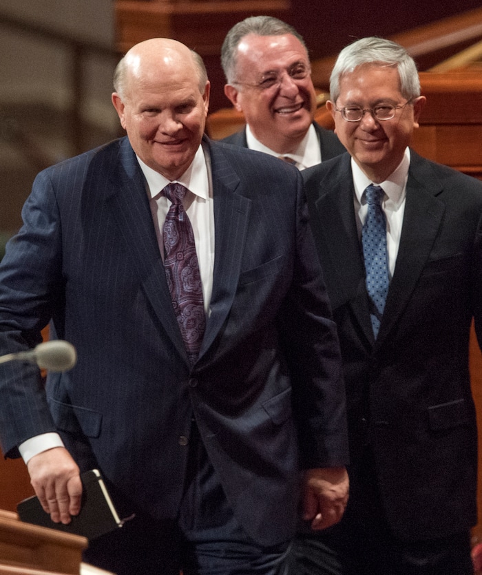 (Rick Egan  |  The Salt Lake Tribune)          Elder Dale G. Renlund leaves the stand followed by Elder Gerrit W. Gong and Elder Ulisses Soares, after the Saturday morning session of the188th Annual General Conference in Salt Lake City,  Saturday, March 31, 2018.
