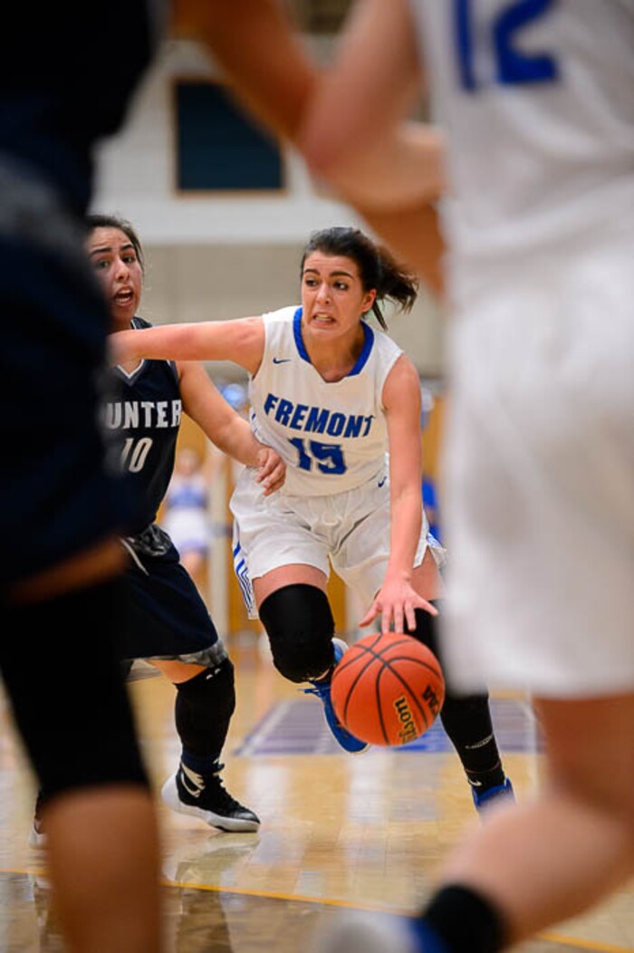 (Trent Nelson | The Salt Lake Tribune)  Fremont's Mazzie Melaney (15) drives on Hunter's Gabbreilla Cuevas (10) as Hunter faces Fremont in the 6A High School Girls' Basketball Tournament at SLCC in Taylorsville, Tuesday Feb. 20, 2018.