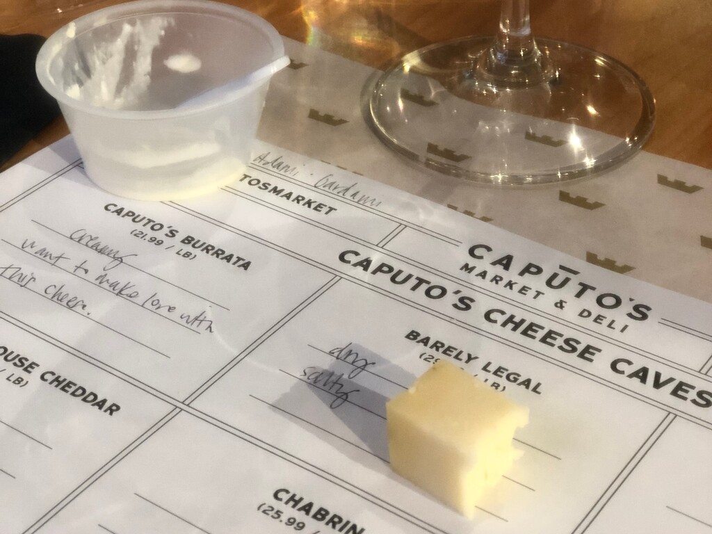 (Marina Gomberg | The Salt Lake Tribune)  The Gombergs went to a Caputo's cheese and wine tasting. Marina had not enough cheese, but probably a bit too much wine.