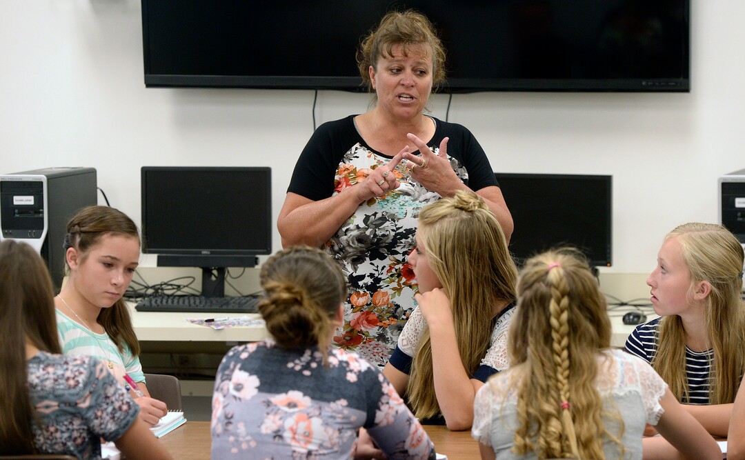 (Al Hartmann  |  The Salt Lake Tribune)  Teacher's aid Kelly Kunzler talks about possible careers and getting part time work in the real world to an all girls 7th and 8th grade class at Park Valley School Wednesday August 30.