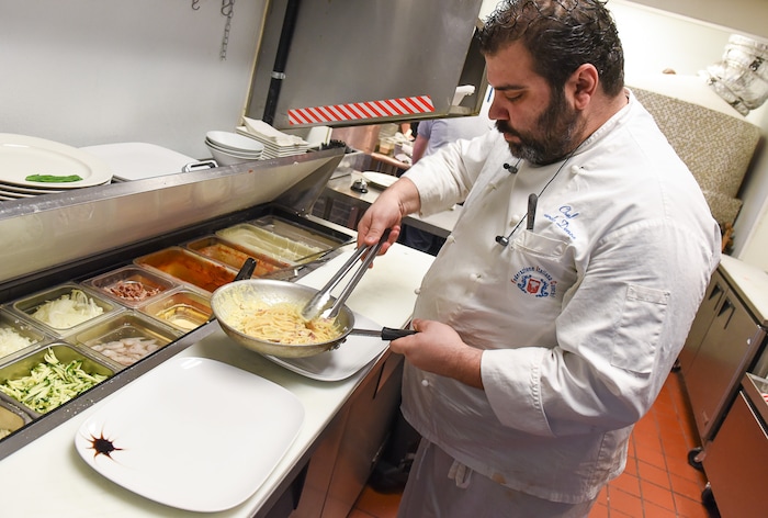 (Francisco Kjolseth | The Salt Lake Tribune) Chef Gerardo Denzo prepares an order of spaghetti alla carbonara with bacon, onion, cream and egg at Terra Mia Italian restaurant in Draper, a sister restaurant to Terra Mia in Orem.