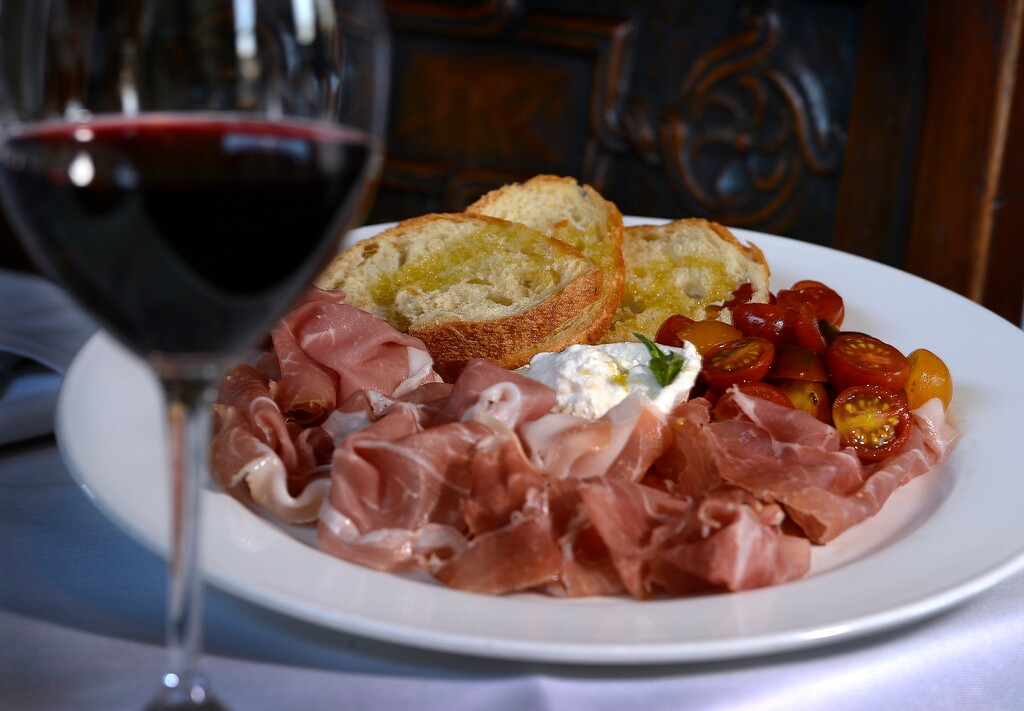 (Tribune file photo) The burrata and prosciutto appetizer at Veneto Ristorante Italiano in Salt Lake City, which was recently given a Wine Spectator Restaurant Award.