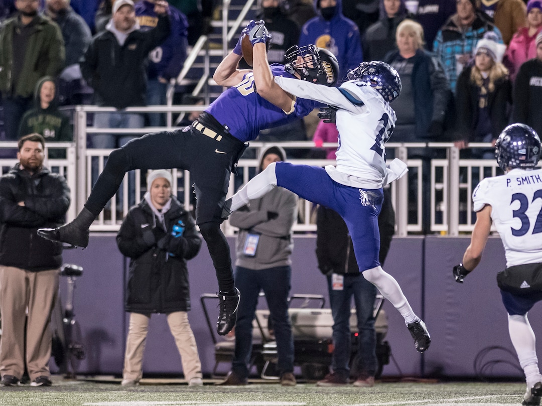 James Madison wide receiver Riley Stapleton (10) makes the catch against Weber State defensive back Jeremy Maxwell (23) during the first half of an NCAA college football game in the quarterfinals of the FCS playoffs Friday, Dec. 8, 2017, in Harrisonburg, Va. (Daniel Lin/Daily News-Record via AP)