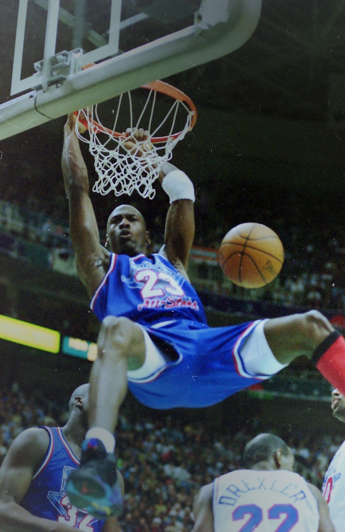 (Steve Griffin  | Tribune File Photo)  Michael Jordan gets a slam dunk in the 1993 All Star Game at the Delta Center in Salt Lake City, Sunday, Feb. 21, 1993.