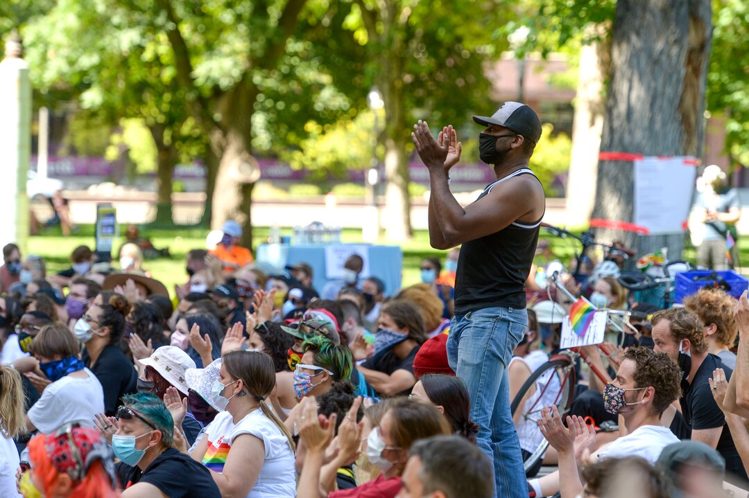 (Leah Hogsten  |  The Salt Lake Tribune) A man in the crowd claps at the words of Rep. Sandra Hollins, D-Salt Lake City. Over 1,000 Pride for Black Lives Matter supporters rallied at Liberty Park, Sunday, June 14, 2020 for over three hours before marching throughout Salt Lake City to join the Las Vidas Negras Importan Rally at Washington Square.