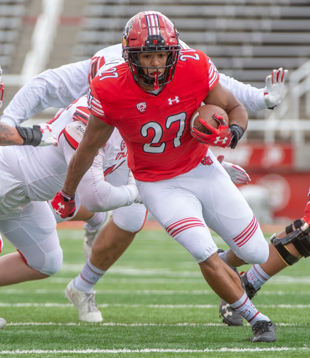 (Rick Egan  |  The Salt Lake Tribune)  Utah running back Mason Woodward (27) runs the ball, in Utah's spring Red-White game at Rice-Eccles Stadium, Saturday, April 13, 2019.