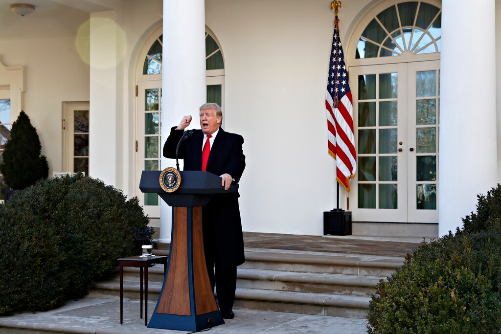 (AP Photo/Jacquelyn Martin) President Donald Trump announces a deal to temporarily reopen the government, Friday, Jan. 25, 2019, from the Rose Garden of the White House in Washington.