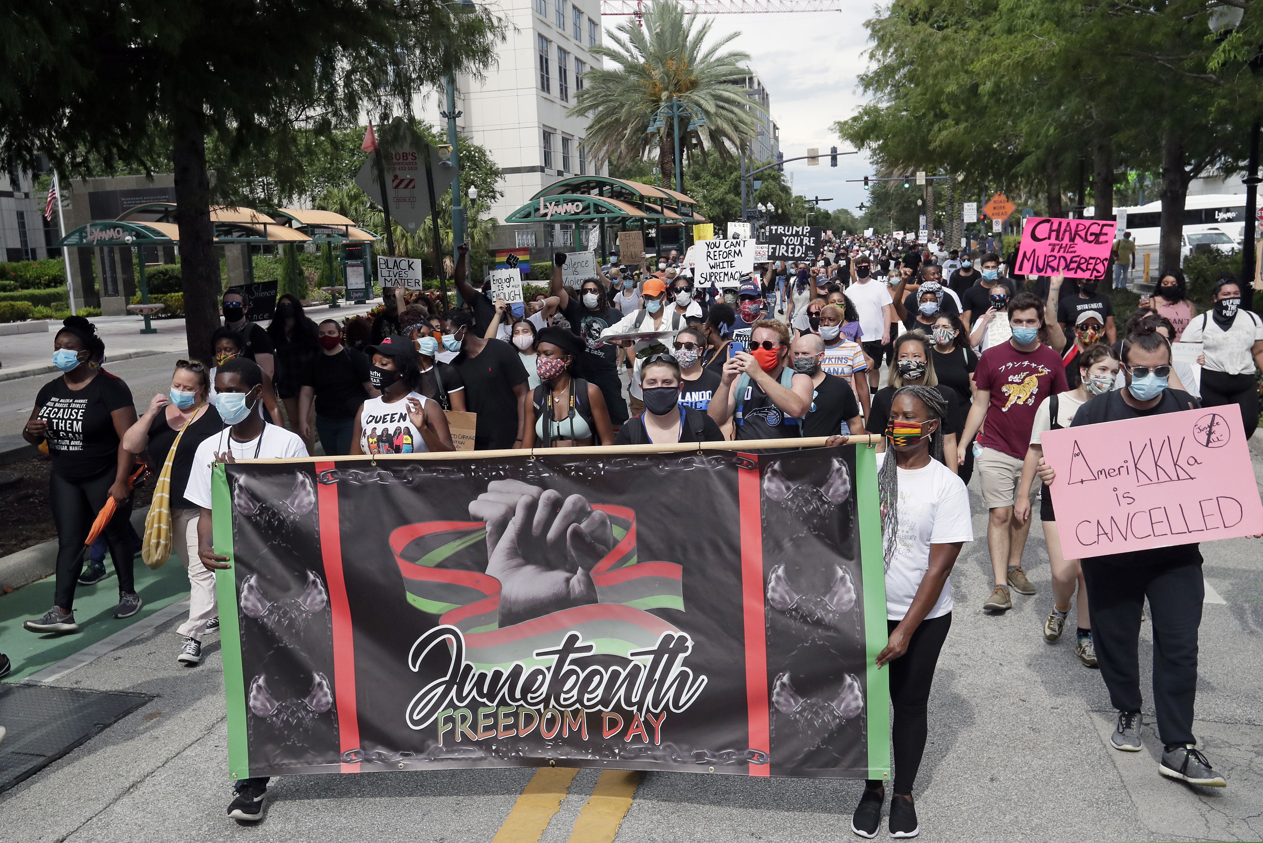 (John Raoux | AP photo)
Demonstrators march through downtown Orlando, Fla., during a Juneteenth event Friday, June 19, 2020. Juneteenth marks the day in 1865 when federal troops arrived in Galveston, Texas, to take control of the state and ensure all enslaved people be freed, more than two years after the Emancipation Proclamation.