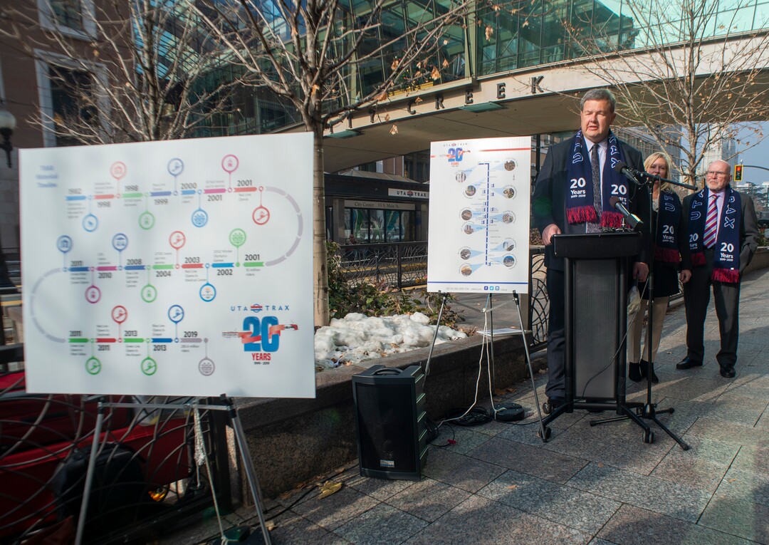 (Rick Egan  |  The Salt Lake Tribune)      Carlton Christensen speaks as officials celebrate the 20th anniversary of TRAX trains during a news conference at the City Creek Trax stop on Main Street in Salt Lake City, Wednesday, Dec. 4, 2019.