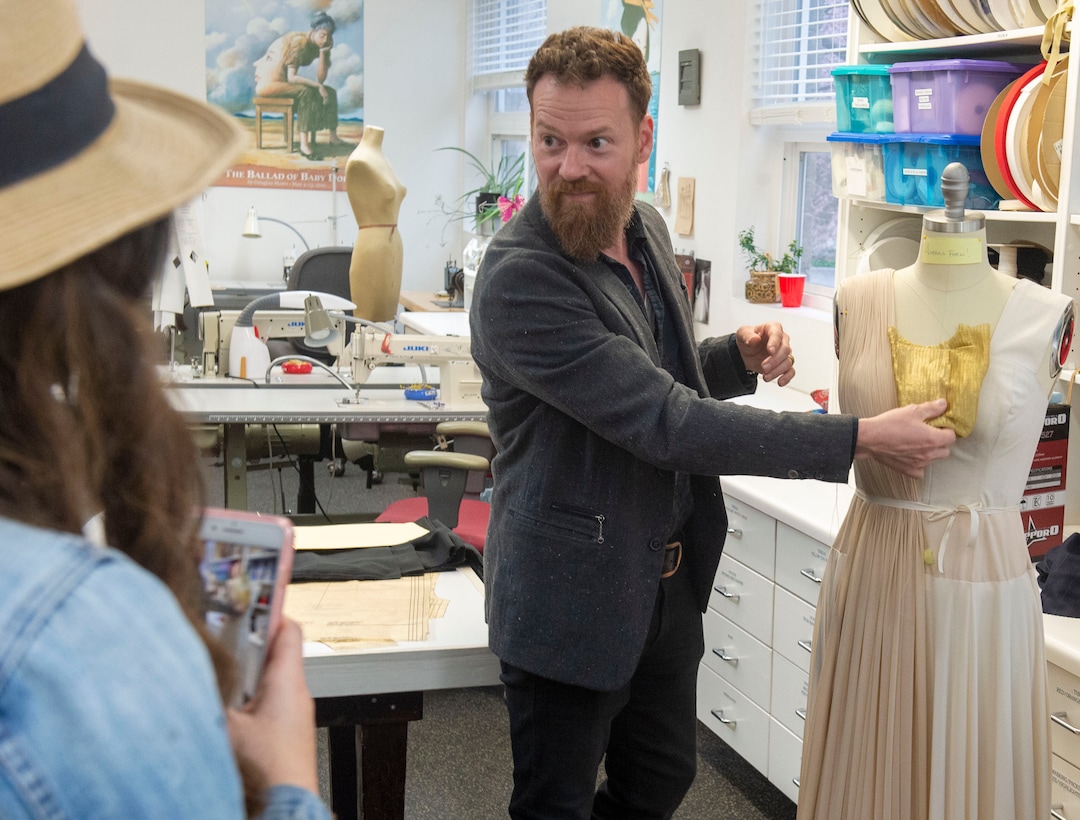 (Rick Egan  |  The Salt Lake Tribune)  "Project Runway" alum Bradon McDonald shows some of his original designs during a preview event for "Norma," at the Utah Opera Production Studios, Monday, April 15, 2019.