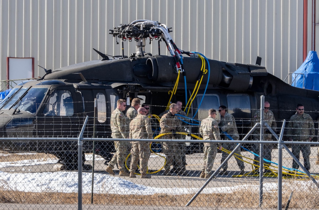 (Francisco Kjolseth | The Salt Lake Tribune) Recovery operations for two Utah Army National Guard UH-60 Black Hawk helicopters involved in a training accident in the Mineral Basin area last week are performed by a CH-47 Chinook helicopter and brought to the Heber Valley Airport on Wednesday, March 2, 2022.