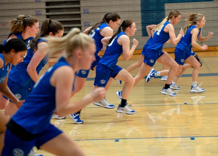 (Francisco Kjolseth  | The Salt Lake Tribune) Fremont girls basketball players run though drills during a recent practice on Wednesday, Feb. 24, 2021.