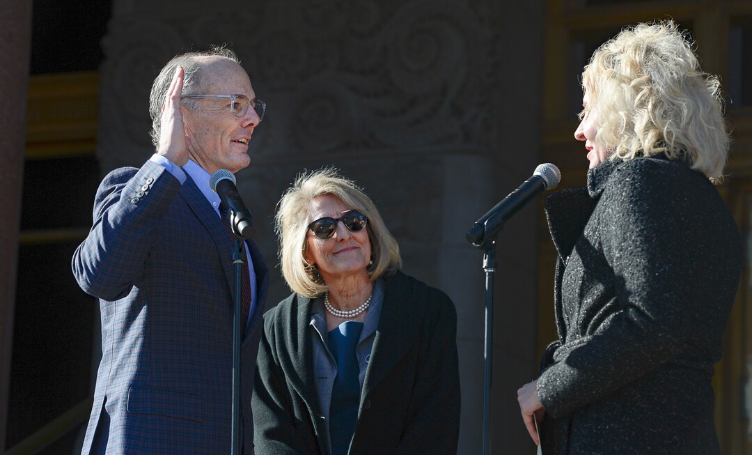 (Francisco Kjolseth  |  The Salt Lake Tribune) Daniel E. Dugan, joined by his wife Sarah, is sworn in as District 6 Councilman by City Recorder Cindi Mansell at Salt Lake City Hall on Monday, Jan. 6, 2020.