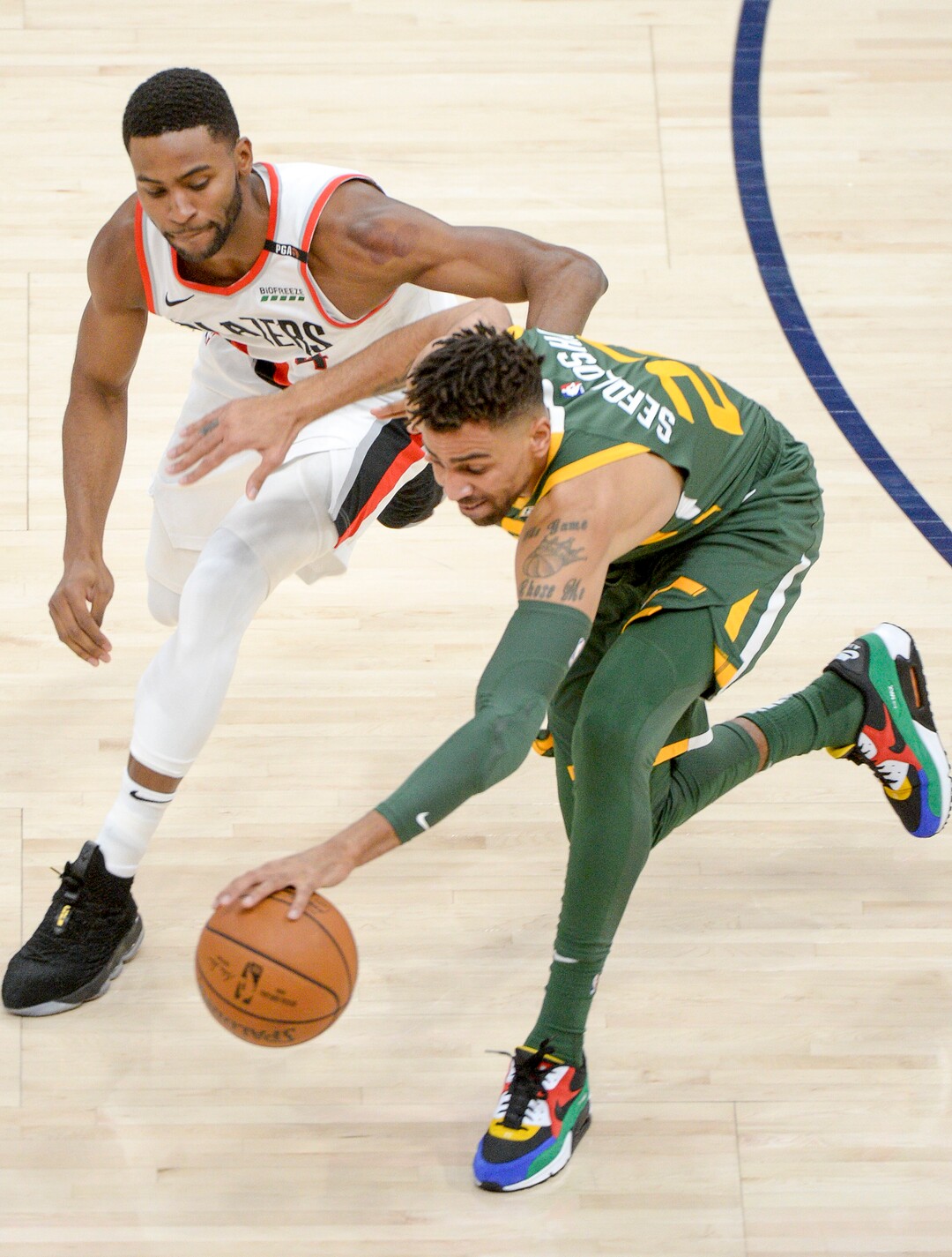Leah Hogsten  |  The Salt Lake Tribune  Utah Jazz forward Thabo Sefolosha (22) beats Portland Trail Blazers forward Maurice Harkless (4) to the ball as the Utah Jazz host the Portland Trail Blazers Christmas night at Vivint Smart Home Arena.