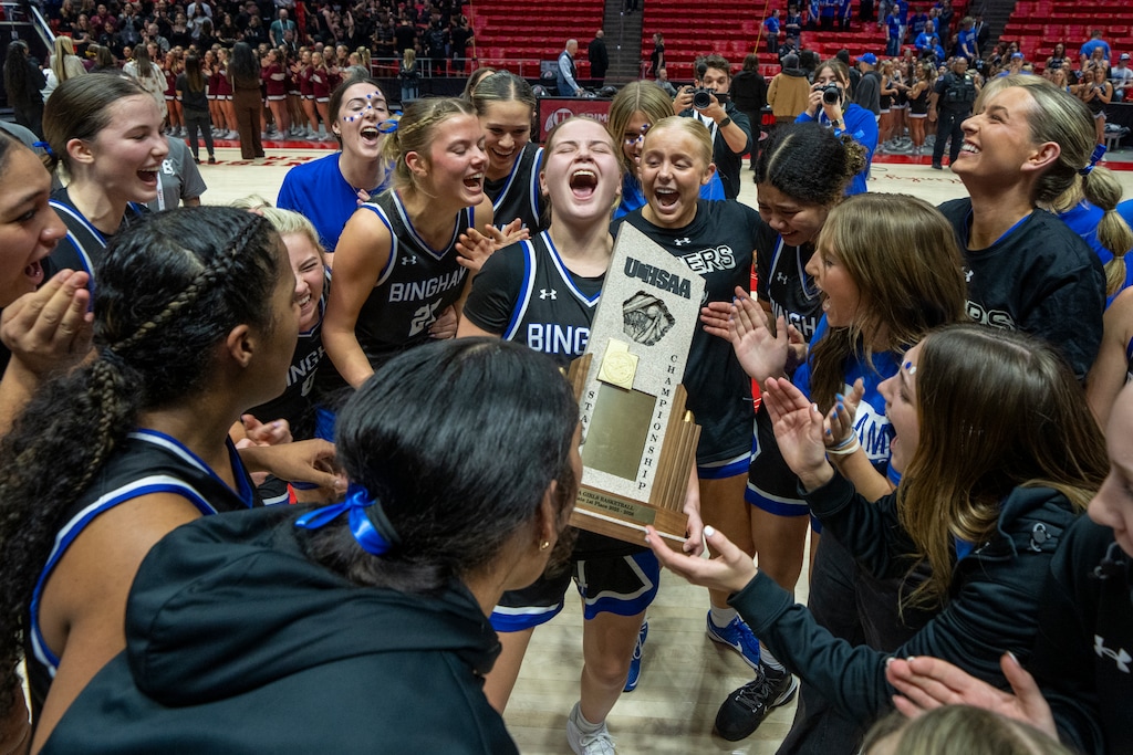 (Rick Egan | The Salt Lake Tribune)  The Bingham Miners celebrate their 6A State  Championship over the Lone Peak Knights at the Jon M. Huntsman Center on Friday.