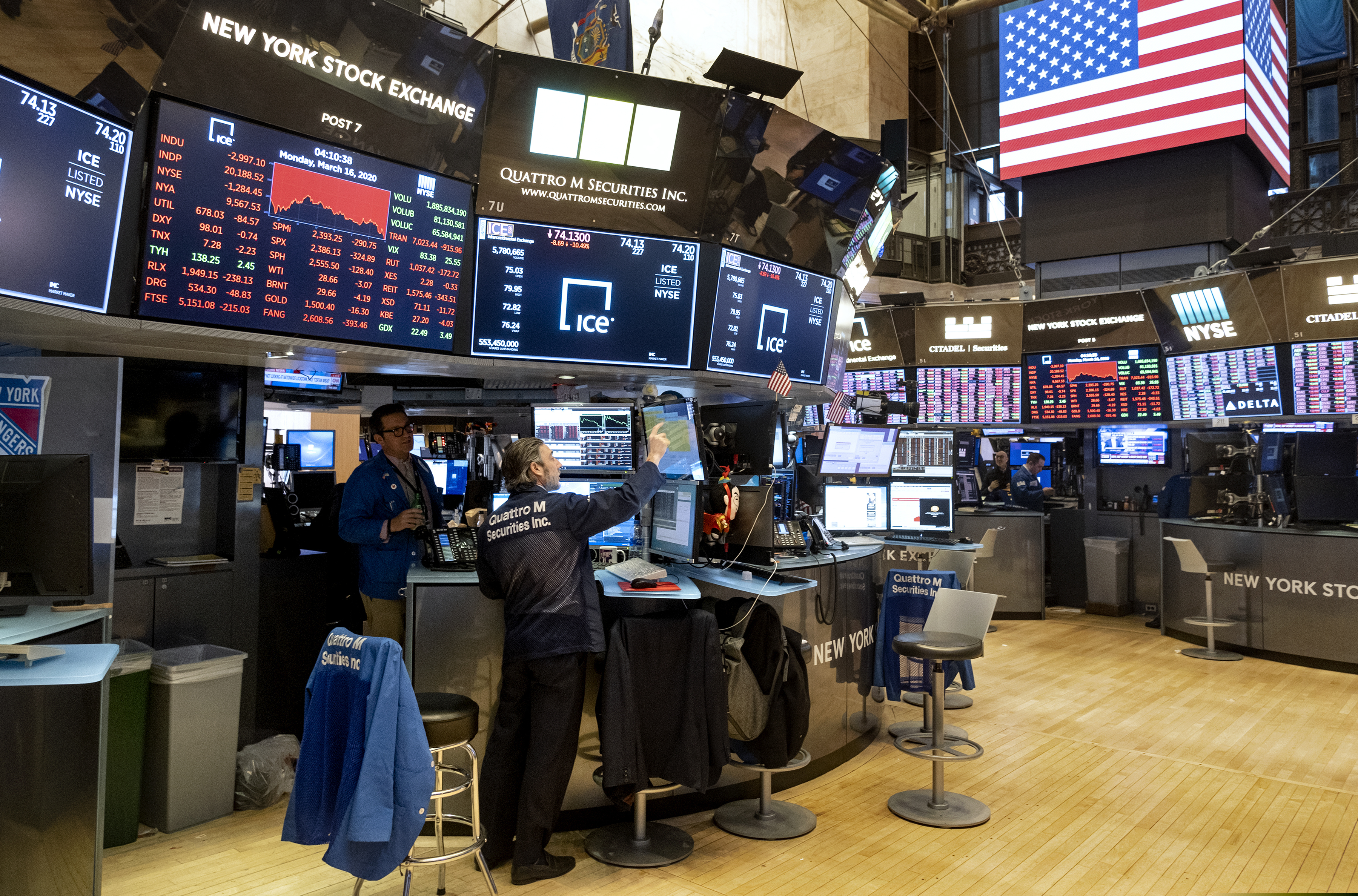 (Craig Ruttle | AP file photo) Traders work on the floor of the New York Stock Exchange near the end of the trading day on March 16, 2020.