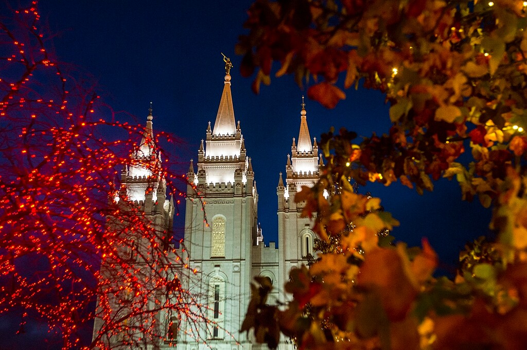(Chris Detrick  |  The Salt Lake Tribune)  Visitors look at Christmas Lights on Temple Square Friday, November 24, 2017.  The first year the light were put up on Temple Square was in 1965. The lights will run through the end of the year. 