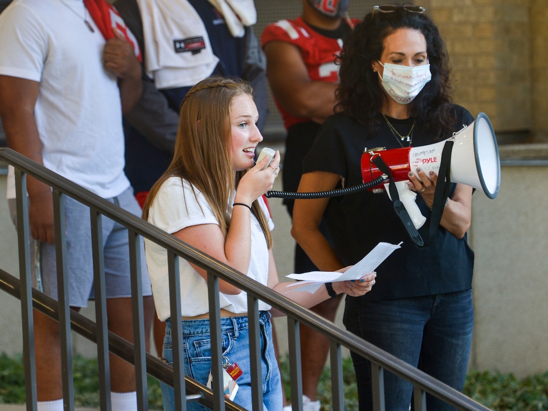 (Leah Hogsten  |  The Salt Lake Tribune) Highland High School student Grace Conde addresses the crowd Wednesday evening. Parents and students within the Salt Lake City School District rally for K-12 students to return in-person to school this fall, July 15, 2020.