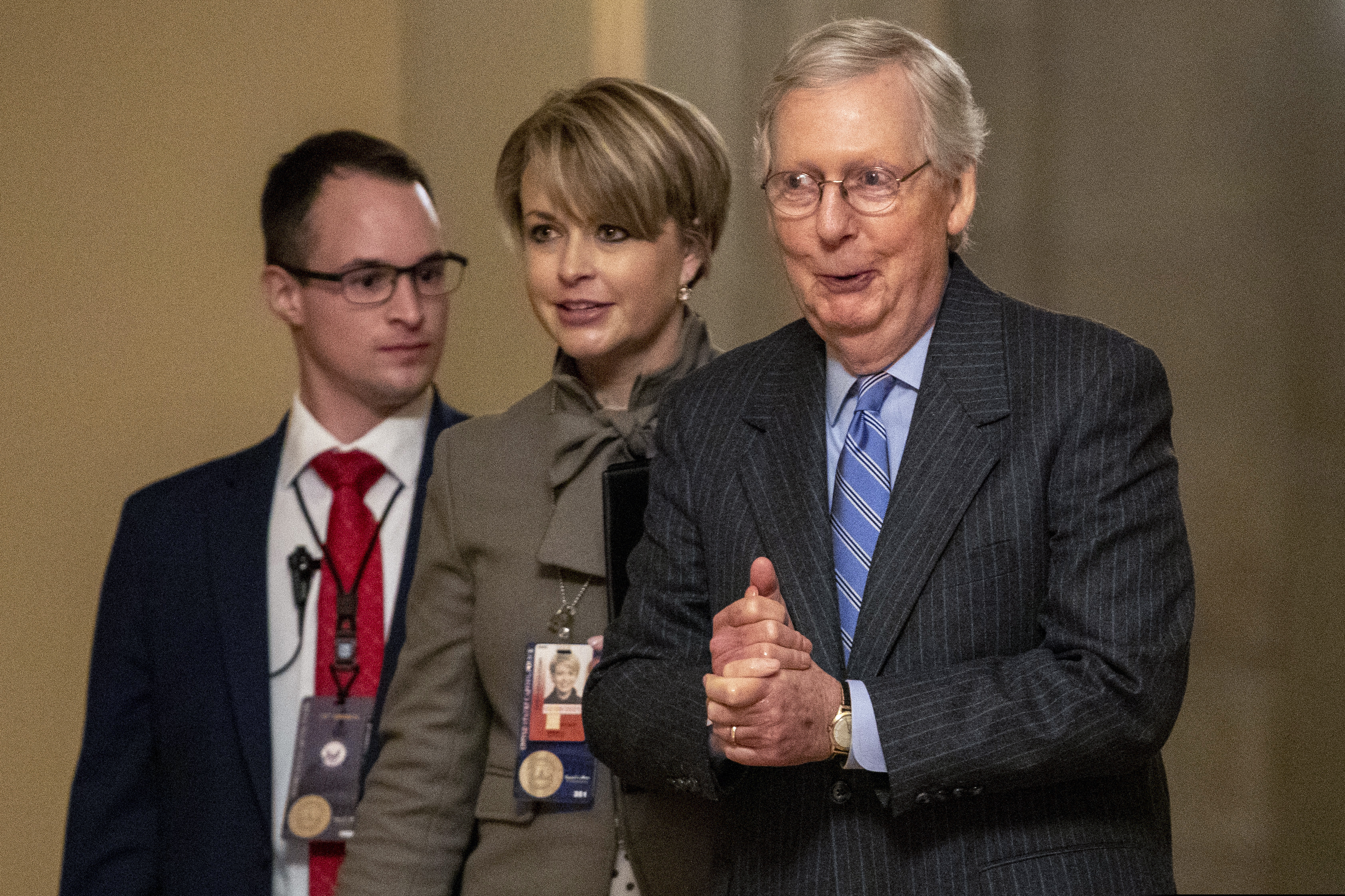 (Jacquelyn Martin | AP) Senate Majority Leader Mitch McConnell of Ky., right, walks to meet with Senate Republicans on Capitol Hill in Washington, Friday, Jan. 31, 2020, after the Senate voted to not allow witnesses in the impeachment trial of President Donald Trump on charges of abuse of power and obstruction of Congress.